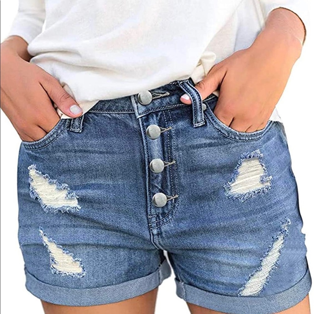 Distressed button fly women’s shorts size Small.